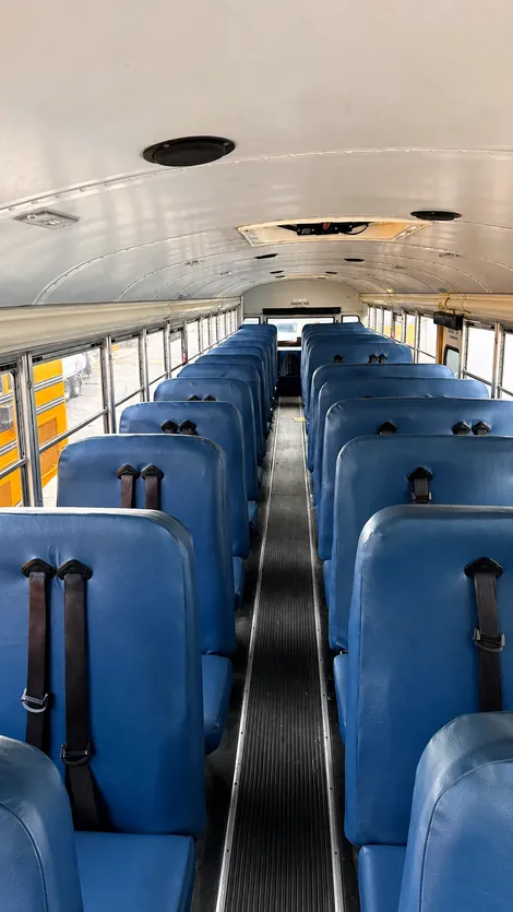 School bus interior with restored blue seating