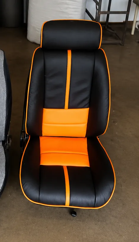 Black and orange custom bucket seat